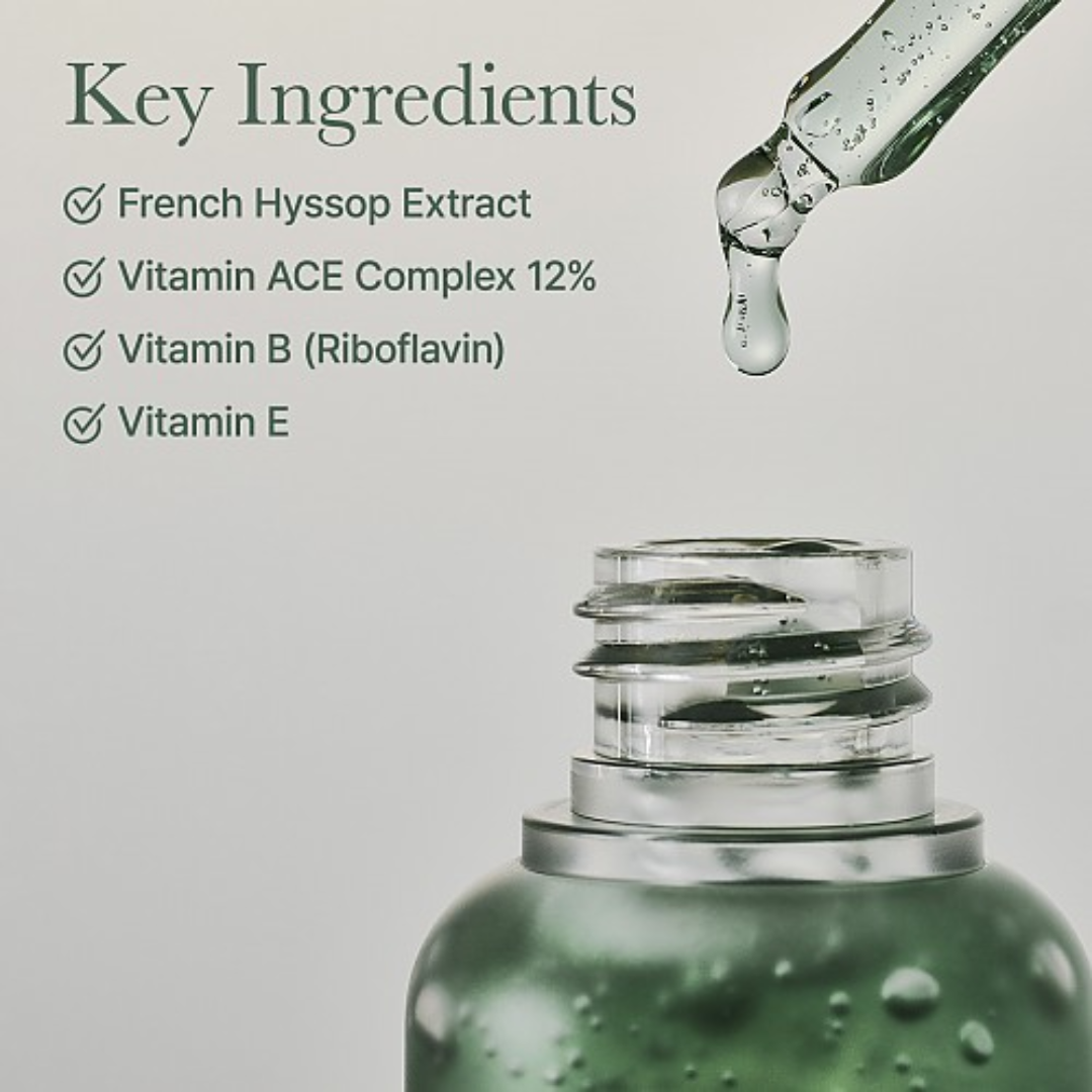 Skincare serum bottle with dropper and list of key ingredients on a light gray background